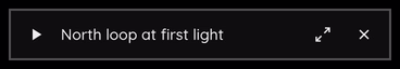 The miniplayer minimized to a compact bar.